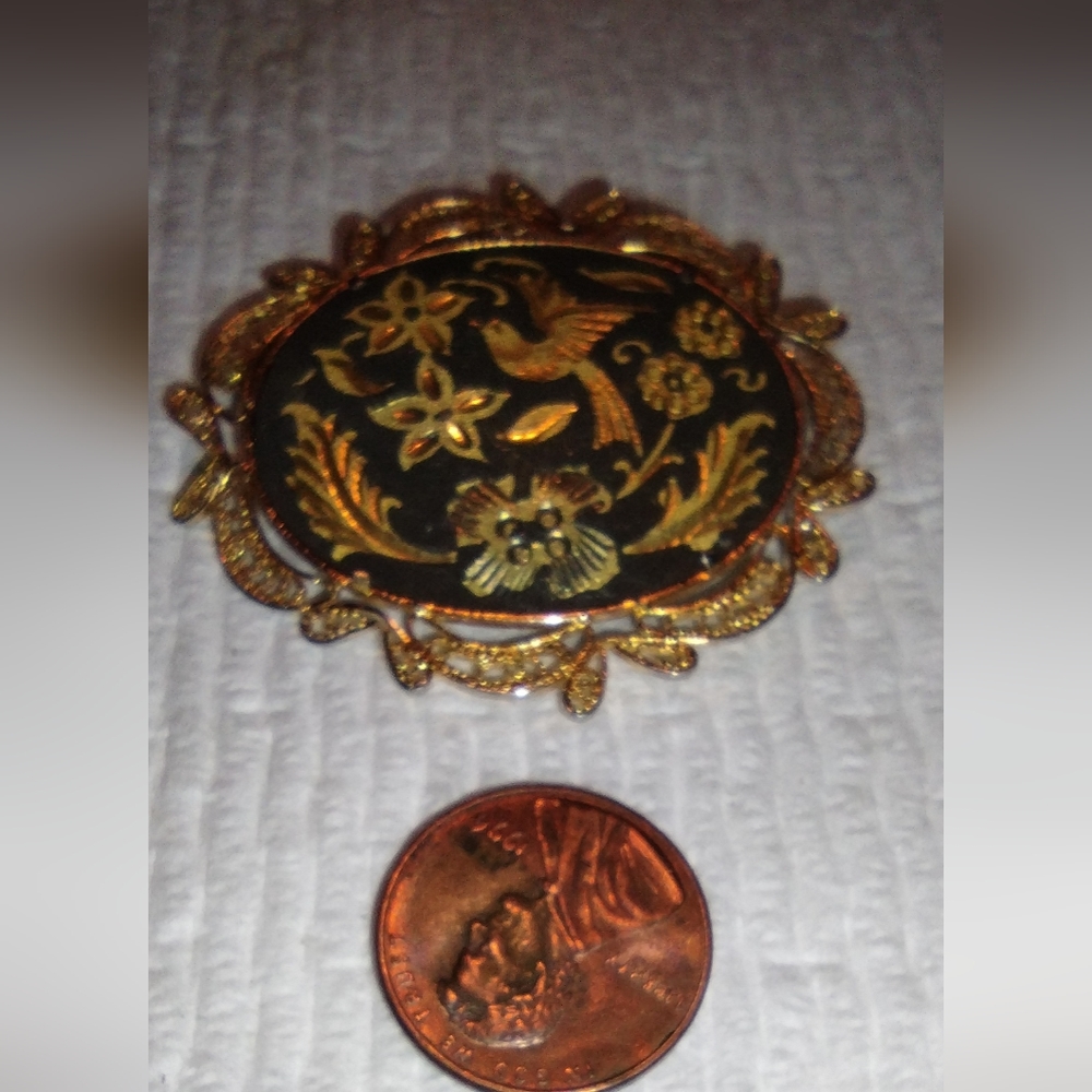 Vintage etched gold brooch